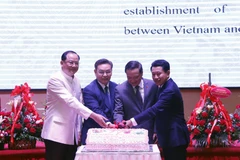 Giữ gìn và phát triển quan hệ hữu nghị đặc biệt Việt Nam-Lào