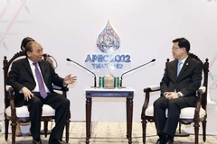 Chủ tịch nước tiếp quan chức Hong Kong và IMF bên lề APEC 2022