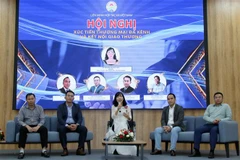 Các đại biểu tọa đàm về xúc tiến thương mại đa kênh, đưa nông sản đặc trưng vùng miền ra thị trường. (Ảnh: Tiến Lực/TTXVN)