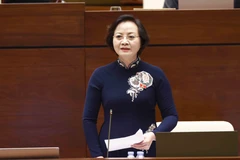 Bộ trưởng Bộ Nội vụ Phạm Thị Thanh Trà trả lời chất vấn. (Ảnh: Doãn Tấn/TTXVN)