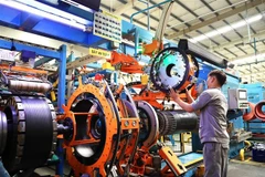 Sản xuất lốp xe ôtô tại Công ty TNHH Sailun Việt Nam, xã Phước Đông, huyện Gò Dầu, Tây Ninh. (Ảnh: Hồng Đạt/TTXVN)