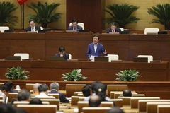 Bộ trưởng Bộ Tài nguyên và Môi trường Trần Hồng Hà phát biểu giải trình, làm rõ một số vấn đề đại biểu Quốc hội nêu. (Ảnh: Doãn Tấn/TTXVN)