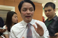 Ông Nguyễn Đức Hưởng trả lời phỏng vấn bên lề hội thảo. (Ảnh: Thúy Hà/Vietnam+)