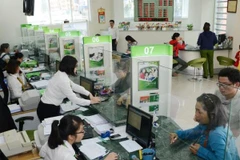 Giao dịch tại Vietcombank. (Nguồn: Vietcombank)