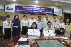 Lãnh đạo hai bên tham gia ký kết. (Nguồn: Vietcombank)