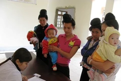 Đăng khí khám sàng lọc tim miễn phí tại Sơn La. (Ảnh: Hương Lê/Vietnam+)