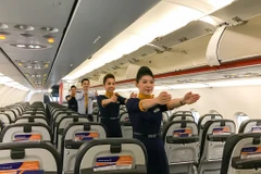 Tông màu xanh chủ đạo mang đến cảm giác an toàn, bền vững và màu cam đại diện cho tinh thần trẻ trung, tràn đầy năng lượng. (Ảnh: Tiến Sỹ/Vietnam+)