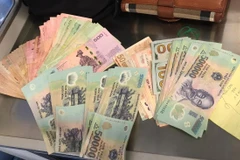 Hành khách bỏ quên tài sản trên chuyến bay của Vietnam Airlines. (Ảnh: CTV/Vietnam+)