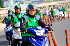 Tài xế chạy ứng dụng Gojek tại thị trường Việt Nam. (Ảnh: PV/Vietnam+)
