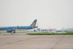 Máy bay trên đường lăn ra đường băng để chuẩn bị cất cánh tại một sân bay. (Ảnh: Việt Hùng/Vietnam+)