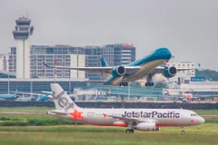 Máy bay của hai hãng hàng không Vietnam Airlines và Jetstar Pacific. (Ảnh: CTV/Vietnam+)