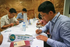 Việc cấp đổi giấy phép lái xe trực tuyến sẽ tạo thuận lợi cho những người dân và giảm các thủ tục hành chính. (Ảnh: Minh Sơn/Vietnam+)