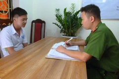 Đối tượng Oanh tại cơ quan công an.