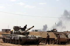 Binh sỹ Iraq trong chiến dịch giành lại quyền kiểm soát nhà máy lọc dầu Baiji. (Nguồn: AFP/TTXVN)