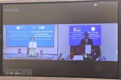 Lễ ký thỏa thuận hợp tác nghiệp vụ giữa TTXVN và KPL ngày 29/3/2022 theo hình thức trực tuyến. (Ảnh: Tuấn Anh/TTXVN)