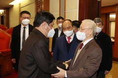 Tổng Bí thư Nguyễn Phú Trọng, Chủ tịch nước Nguyễn Xuân Phúc với các nguyên lãnh đạo cấp cao của Đảng, Nhà nước. (Ảnh: Trí Dũng/TTXVN) 