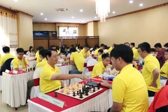 Các vận động viên bắt đầu thi đấu. (Ảnh: Trung Kiên/TTXVN)