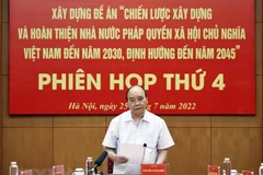 Chủ tịch nước Nguyễn Xuân Phúc chủ trì phiên họp. (Ảnh: Thống Nhất/TTXVN) 