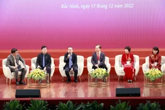 Đại biểu trao đổi, thảo luận bàn tròn và phát biểu ý kiến của một số đại biểu tại Phiên toàn thể. (Ảnh: Doãn Tấn/TTXVN)