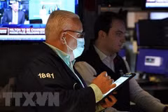 Giao dịch viên tại Sàn giao dịch chứng khoán New York, Mỹ. (Ảnh: AFP/TTXVN)