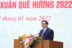 Thủ tướng Phạm Minh Chính phát biểu tại buổi gặp mặt kiều bào dự Xuân quê hương năm 2022. (Ảnh: Dương Giang/TTXVN)