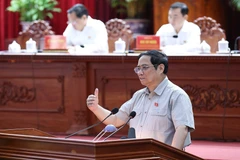 Thủ tướng Phạm Minh Chính phát biểu tại buổi tiếp xúc cử tri thành phố Cần Thơ. (Ảnh: Dương Giang/TTXVN)
