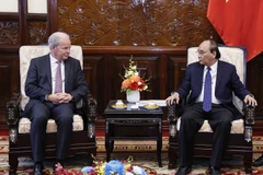 Chủ tịch nước Nguyễn Xuân Phúc tiếp Tổng Giám đốc Điều hành Ngân hàng Thế giới Axel van Trotsenburg. (Ảnh: Thống Nhất/TTXVN) 