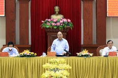 Chủ tịch nước Nguyễn Xuân Phúc làm việc với lãnh đạo chủ chốt tỉnh Tiền Giang. (Ảnh: Thống Nhất/TTXVN)