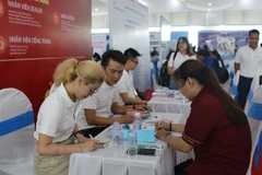 Giao dịch việc làm. (Ảnh: Thanh Vũ/TTXVN)