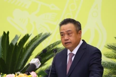 Chủ tịch Ủy ban Nhân dân thành phố Hà Nội Trần Sỹ Thanh phát biểu nhận nhiệm vụ. (Ảnh: Văn Điệp/TTXVN) 