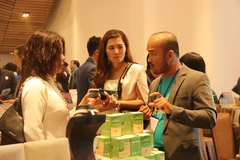 Các doanh nghiệp trao đổi kết nối giao thương trong khuôn khổ Nhịp cầu ASEAN++. (Ảnh: Xuân Anh/TTXVN)