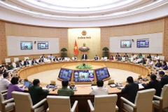 Quang cảnh hội nghị tại điểm cầu Chính phủ. (Ảnh: Dương Giang/TTXVN)