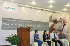 Các khách mời thỉnh giảng tại buổi hội thảo. (Nguồn: PV/Vietnam+)