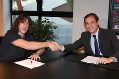Puyol quyết định ký vào bản hợp đồng mới có thời hạn hai năm với Barca. (Nguồn: fcbarcelona.com)