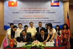 Lãnh đạo hai nước ký kết Biên bản ghi nhớ. (Nguồn: Ngọc Dung/Vietnam+)