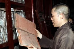 Bộ mộc bản chùa Vĩnh Nghiêm. (Ảnh: Anh Tuấn/TTXVN)