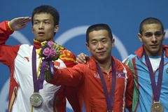 Lực sỹ Om Yun-Chol (giữa) mang về vinh quang cho đoàn thể thao Triều Tiên ở Olympic London 2012. (Nguồn: Getty)