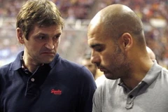 Tito Vilanova và người tiền nhiệm Pep Guardioal. (Nguồn: Reuters)