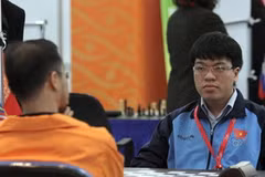 Quang Liêm thi đấu ở nội dung cờ tưởng. (Ảnh: Quang Nhựt/TTXVN)