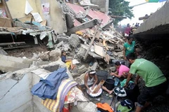 Người dân Philippines đối mặt với hậu quả nặng nề do cơn bão Washi gây ra. (Nguồn: Getty)