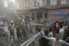 Đụng độ giữa quân đội và người biểu tình ở quảng trường Tahrir. (Nguồn: AP)