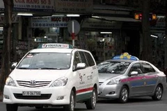 Các hãng taxi đã tiến hành giảm giá cước. (Ảnh: Hoàng Hải/TTXVN)