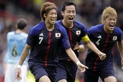 Các cầu thủ Nhật Bản ăn mừng chiến thắng. (Nguồn: Getty)