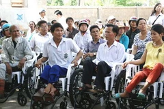 Người tàn tật đang rất cần sự giúp đỡ của mọi người. (Nguồn: TTXVN)