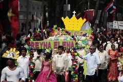 Đoàn người tham gia diễu hành tại Hội chợ các nền văn hóa bạn bè ở Mexico. (Nguồn: Reuters)