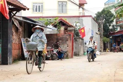 Cuộc sống của người dân xã Sơn Lôi. (Ảnh: Hoàng Hùng/TTXVN)