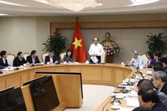 Bộ trưởng, Chủ nhiệm Văn phòng Chính phủ Mai Tiến Dũng chủ trì cuộc họp. (Ảnh: Văn Điệp/TTXVN)