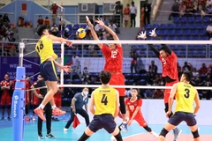 Pha đập bóng của vận động viên Dương Văn Tiên (số 18) đội bóng chuyền nam Việt Nam. (Ảnh: Anh Tuấn/TTXVN)