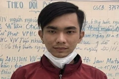 Đối tượng Nguyễn Thanh Huy tại cơ quan công an. (Ảnh: TTXVN phát)