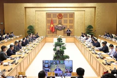 Quang cảnh buổi làm việc. (Ảnh: Dương Giang/TTXVN)